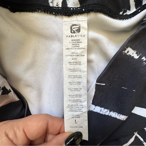 Fabletics Define PowerHold High-Waisted 7/8 Leggings in Black/White/Silver Print - Picture 3 of 4